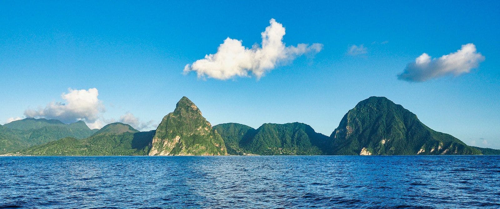 Saint Lucia and a view of the Pitons from the sea.