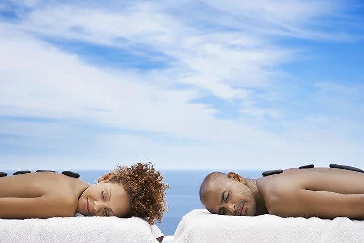 couple having hot stone massage