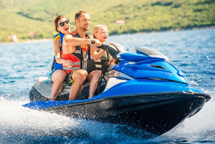 Jet skiing family Top Villas concierge services