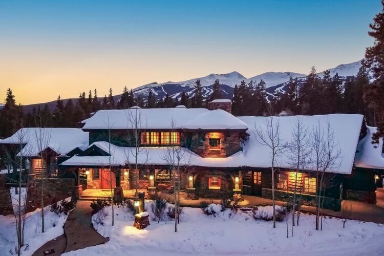 cabin in the snow at dusk