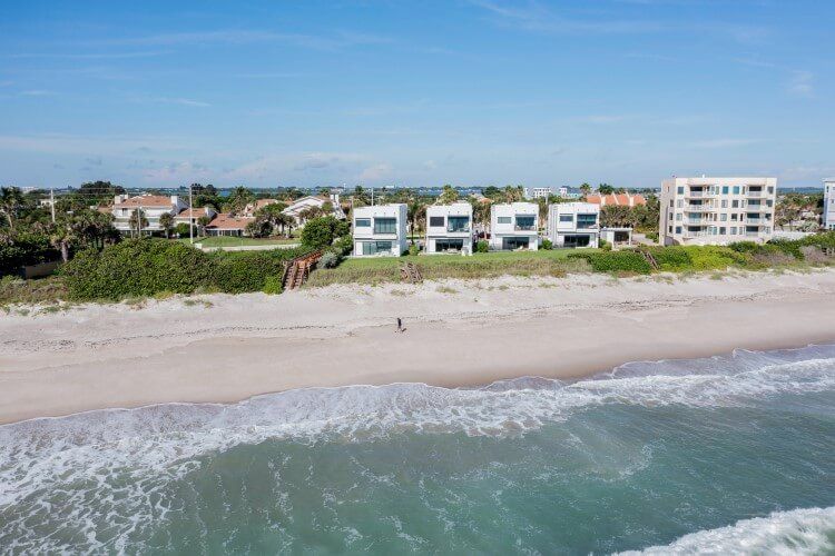 Villatel's Harbor Island resort, a drone shot taken from off of the coast of Melbourne Beach, with vacation rentals along the sand