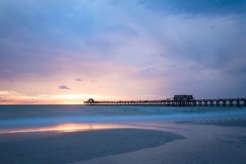 Marco Island pier and beach at sunset