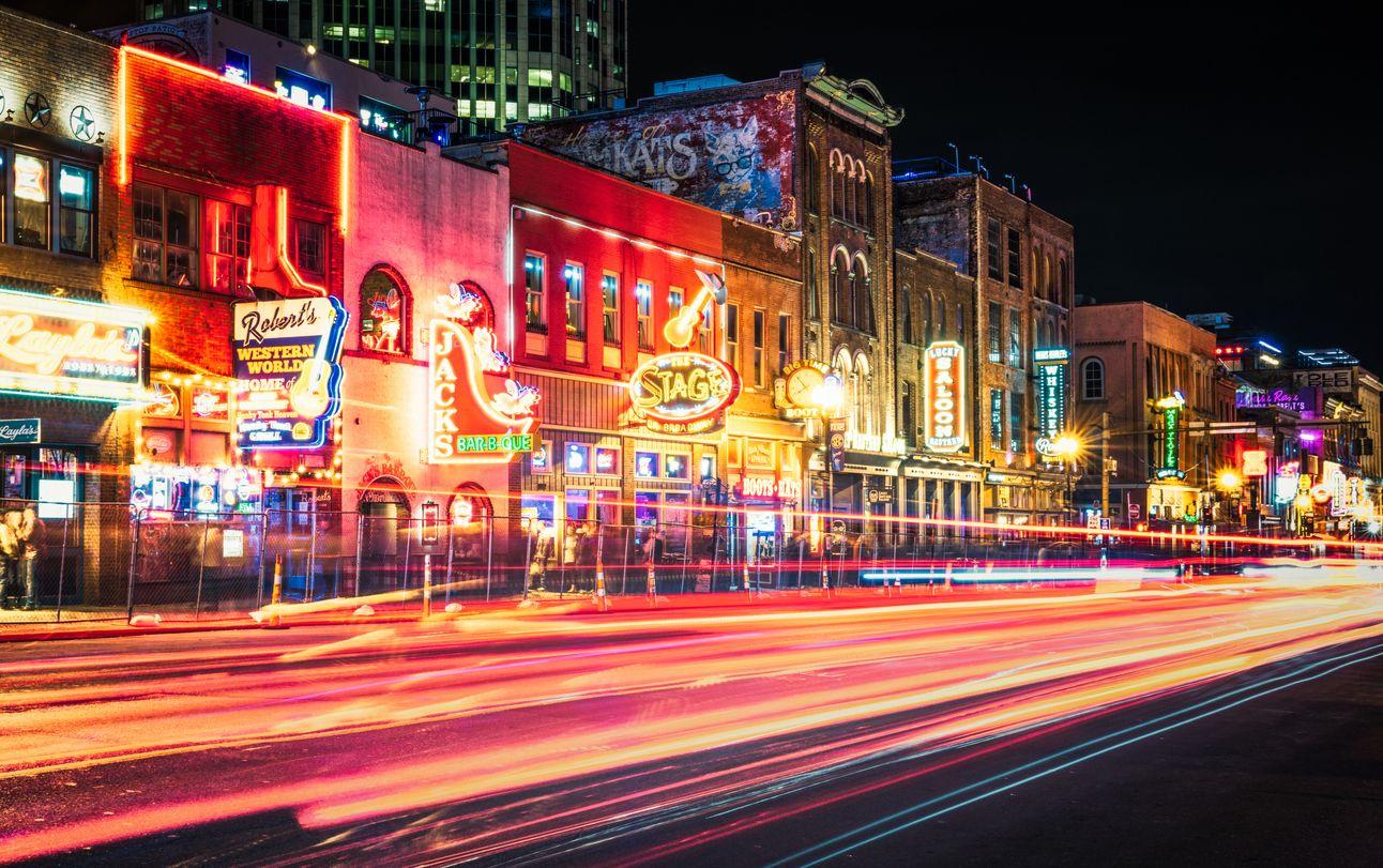 Nashville Airbnb Alternatives with Top Villas, nightime view of Lower Broadway