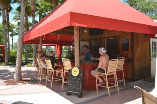 Bar under a red gazebo at Solana Resort
