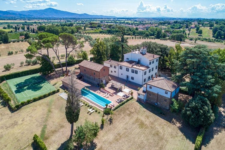 Villa Mirelli in Arezzo, Tuscany with Tuscan fields and mountains in the distance