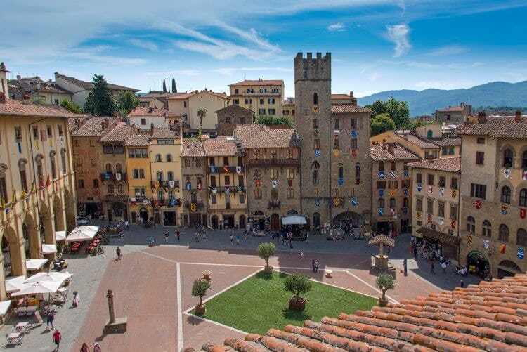 Arezzo town square with historic buildings 