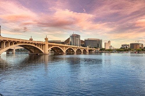 An arched bridge across the river in Tempe