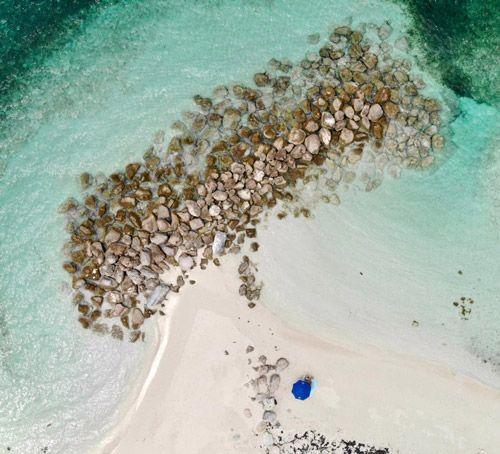 Ariel view of rocky bar at Babalua Beach