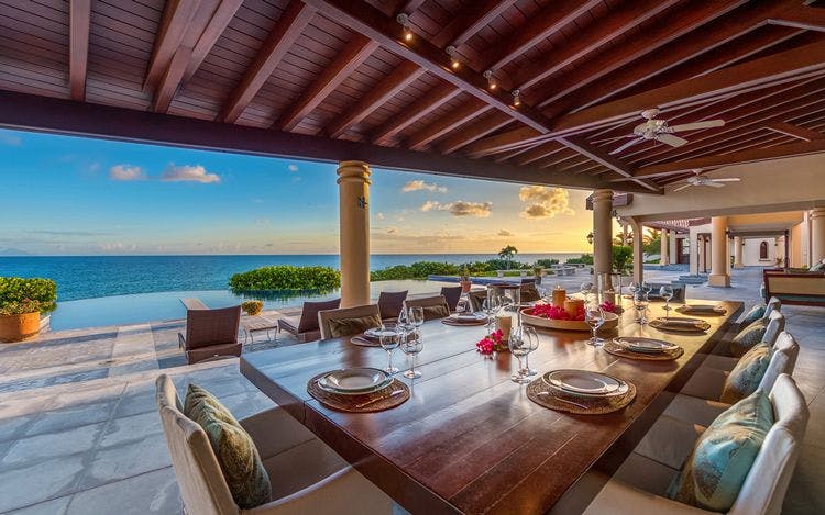 Baie Longue St Martin villas with beautiful views Casa De La Playa covered outside dining area with view of sea