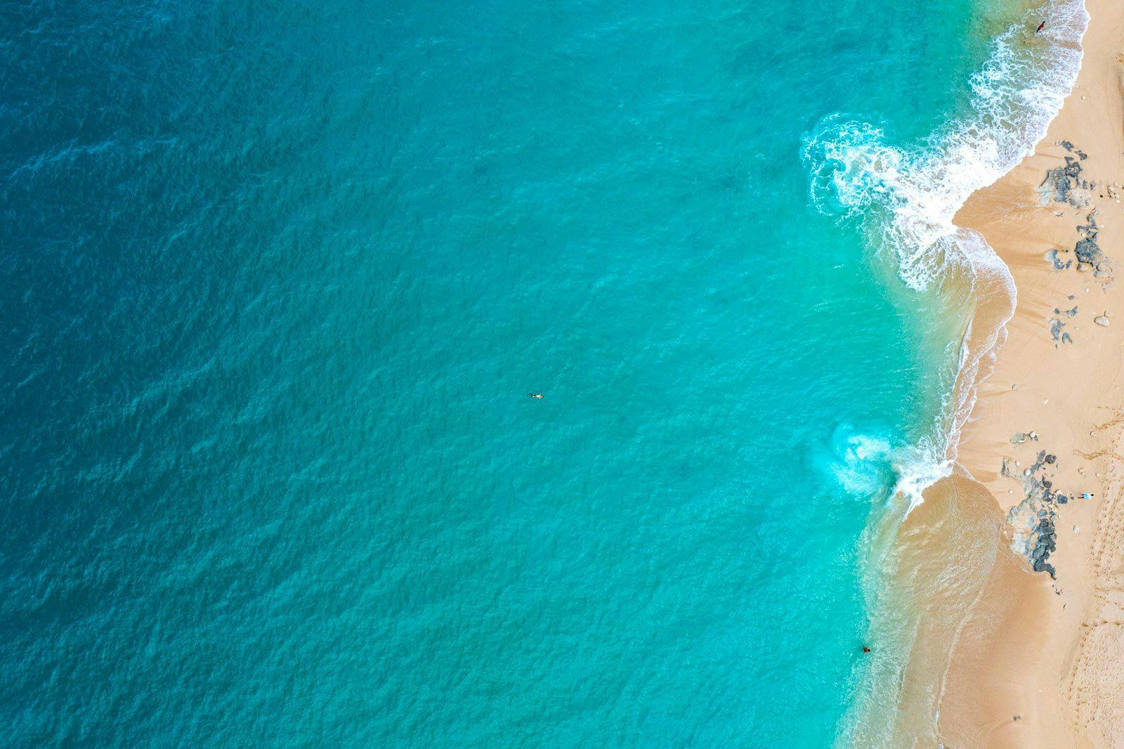 Overhead view of dramatic Saint Martin white sand beach and blue sea