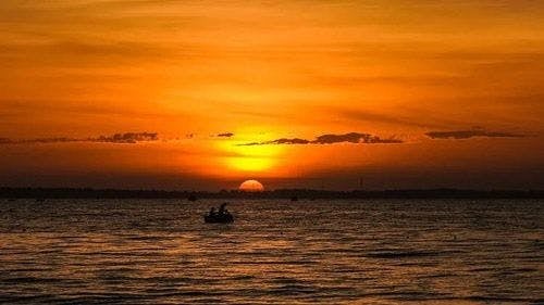 A red and orange sunset over the Caribbean Sea