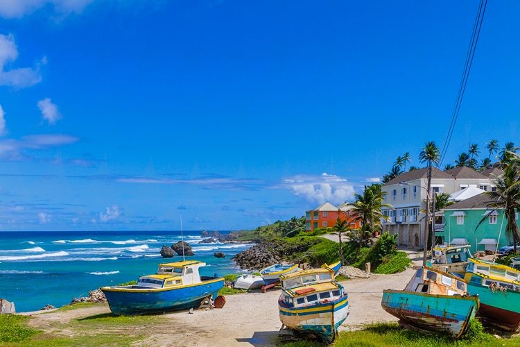 Fishing boats on the coast in a Barbados town