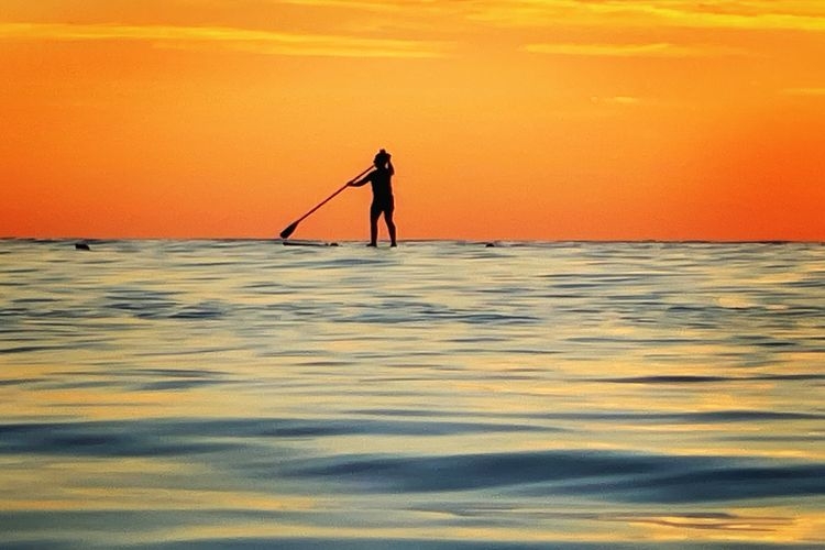 Best time to visit Destin, paddleboarding at sunset, Top Villas