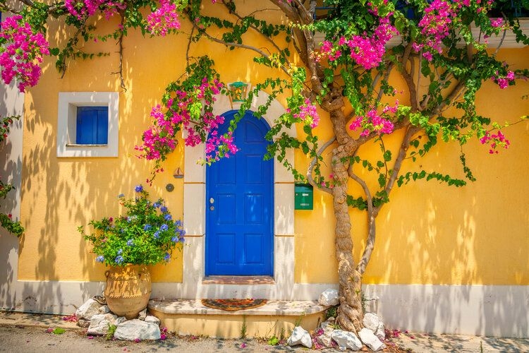 Best time to visit Greece, authentic doorway, charming scene, Top Villas