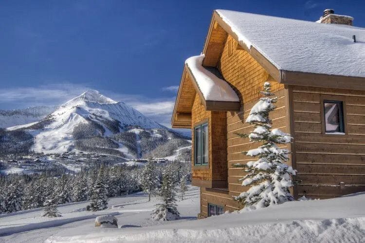 Big Sky 25 cabin in snow covered mountains