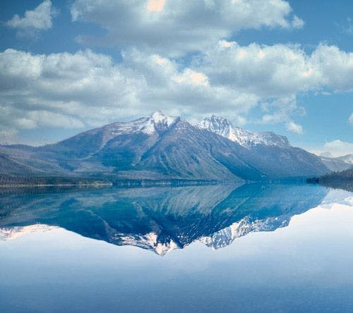 Mountain in Montana reflected in still lake