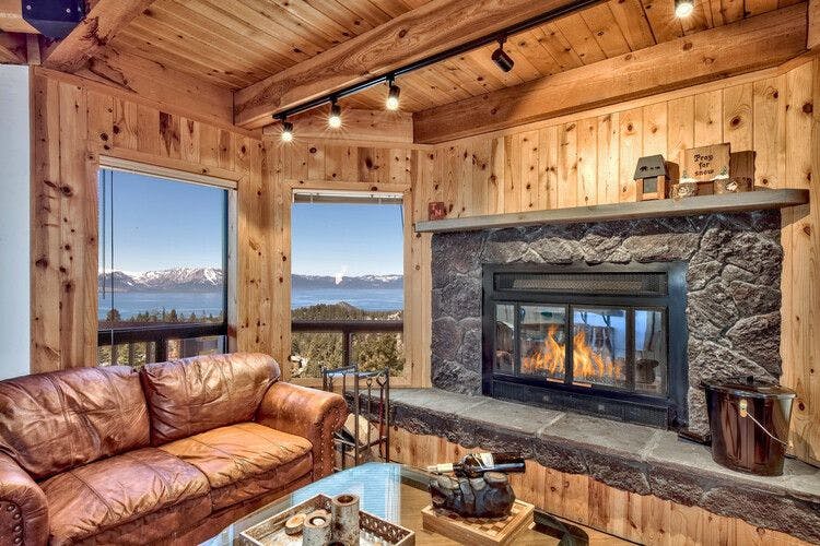 Cosy fireplace in Lake Tahoe cabin overlooking the lake and mountains in Nevada