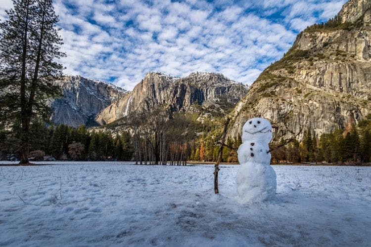 A snowman by the mountains in California