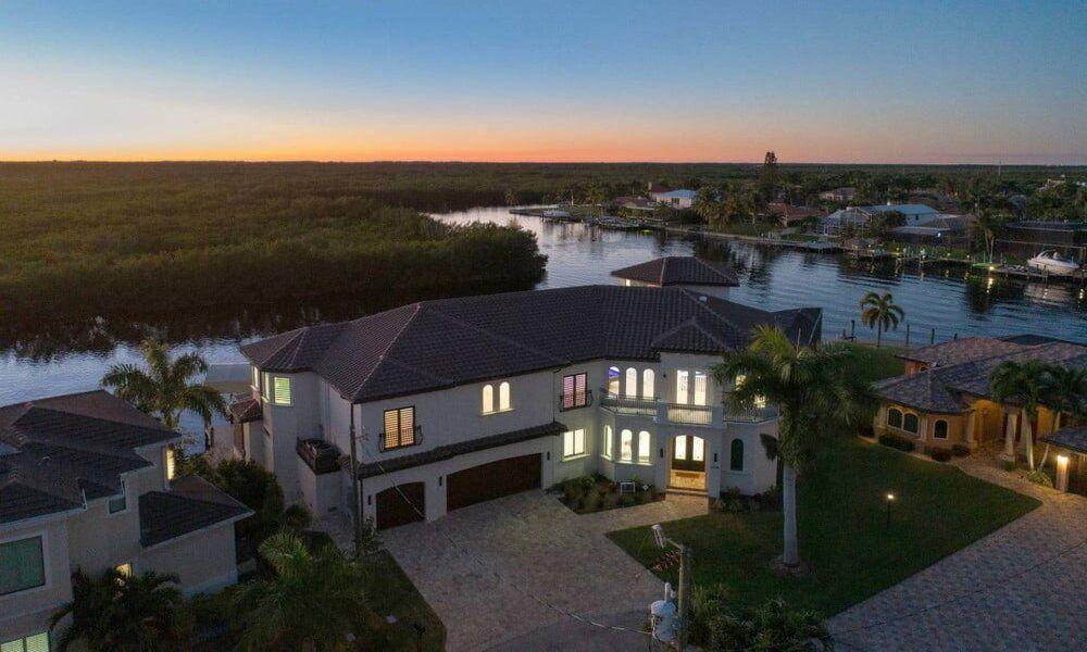 Cape Coral mansion rentals, dusk view of illuminated Cape Coral 315