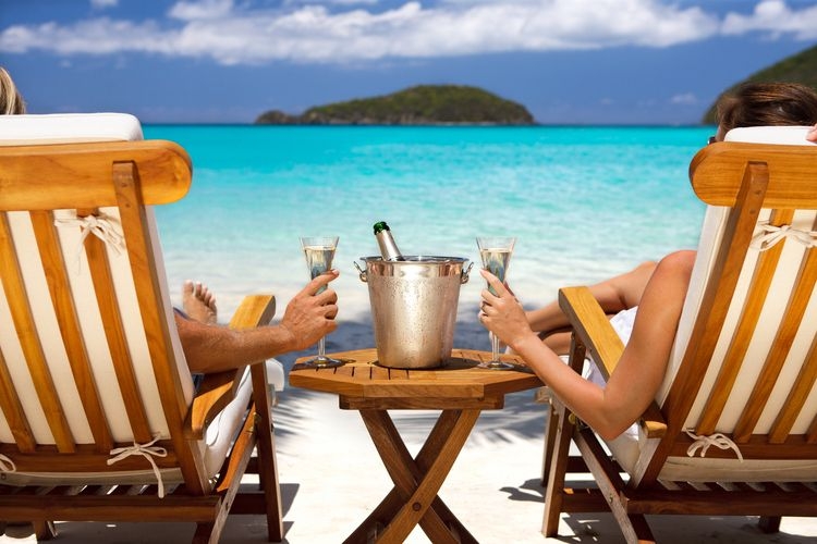 Caribbean holidays, champagne on the beach, Top Villas