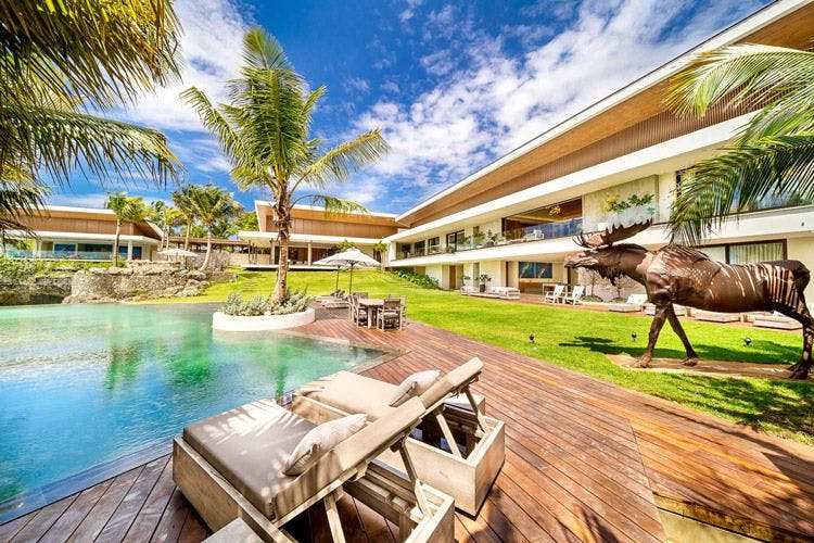 Casa de Campo 0 vacation rental with private pool, sun loungers, and moose statue