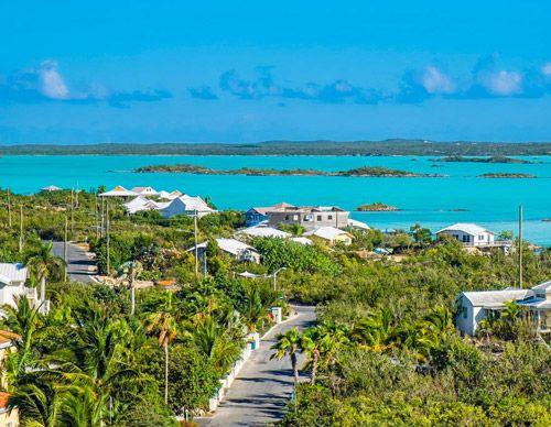 Chalk Sound coastline with a few apartments and villas and the sea behind