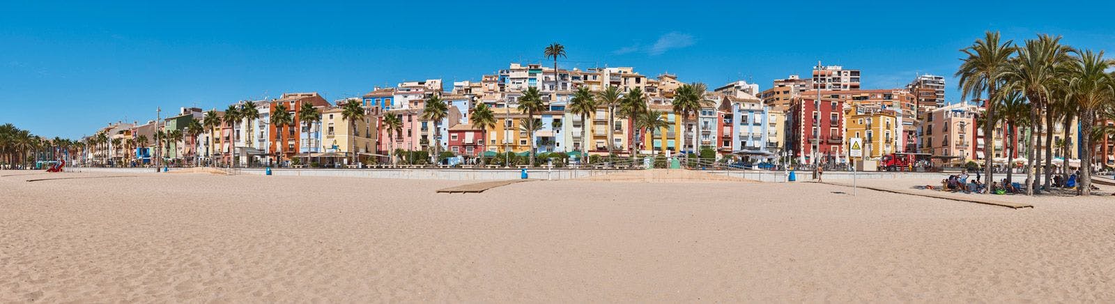 Vilajoyosa colorful town on golden sand beach