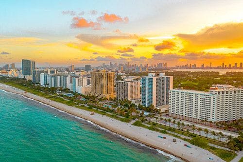 Miami Beach with high rise buildings along the sand
