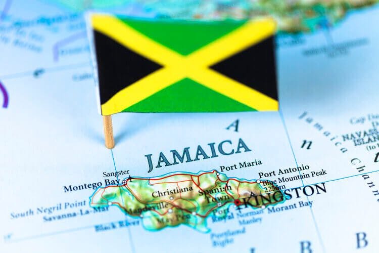 A map of Jamaica with the country flag