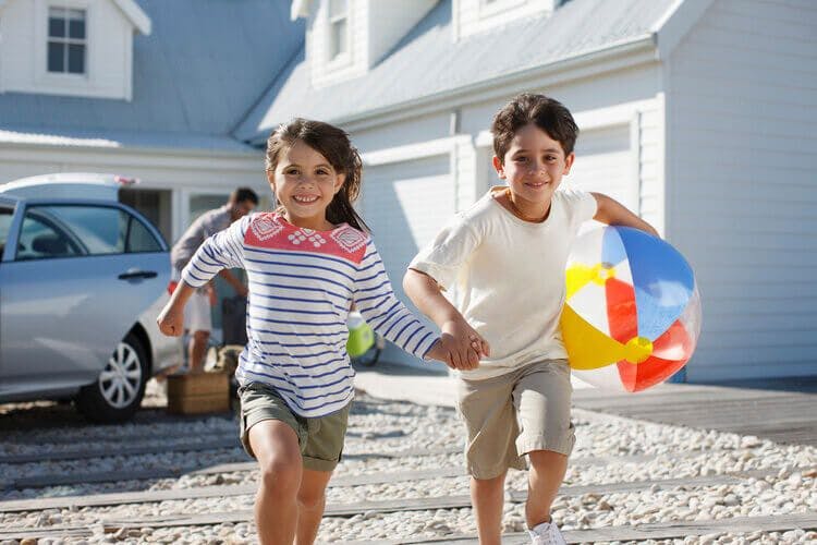 kids running from their florida spring break vacation rental