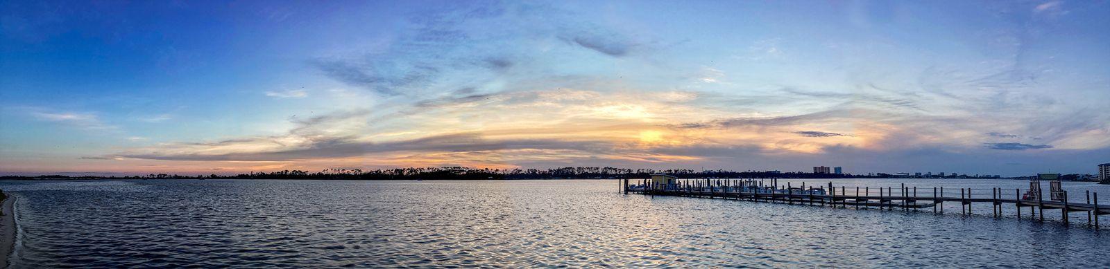 Sunset over a pier in Panama City, in the Florida Panhandle