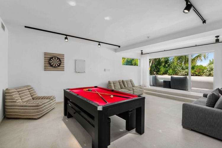 Grace Bay Beach Enclave Ocean View Villa 7 game room with pool table