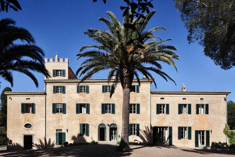 Villa Talamo Grosseto villa with tower and palm trees