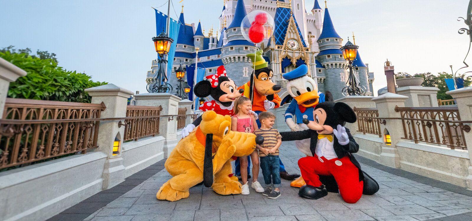 How far is Reunion Resort from Disney World? Disney characters by the castle.