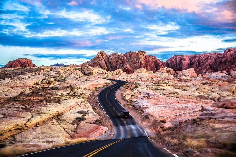 Dramatic desertscape scenery of Nevada, with road meandering through