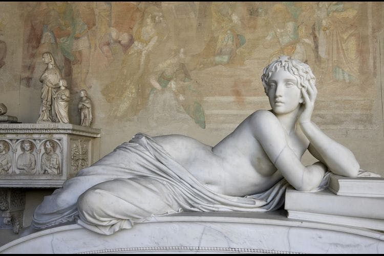 A reclining Roman statue