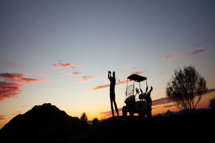 Golf at sunset