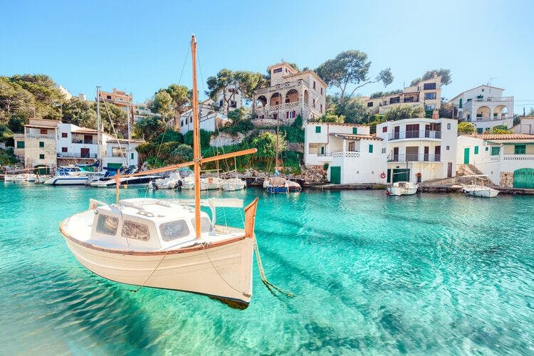 Boat bobbing on the clear waters off Mallorca in Spain