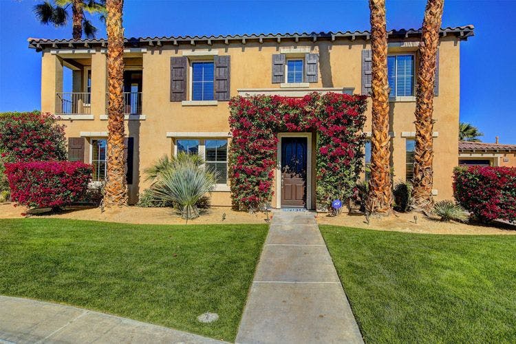 Indio 2 vacation rental with landscaped front lawn