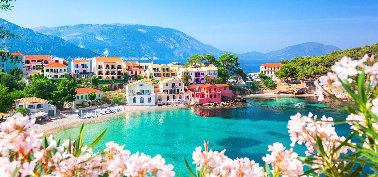 Italy vs Greece vacation, coastline view in Greece, Top Villas