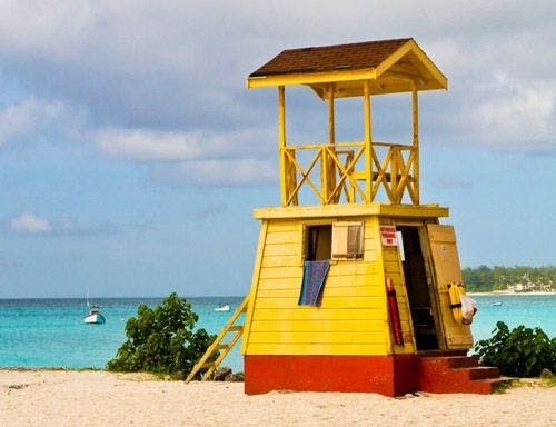 Yellow lifeguard station on the beach in the Caribbean