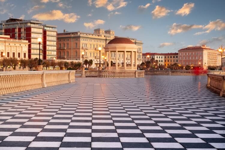 Livorno square with black and white checked flooring and a white domed pavilion