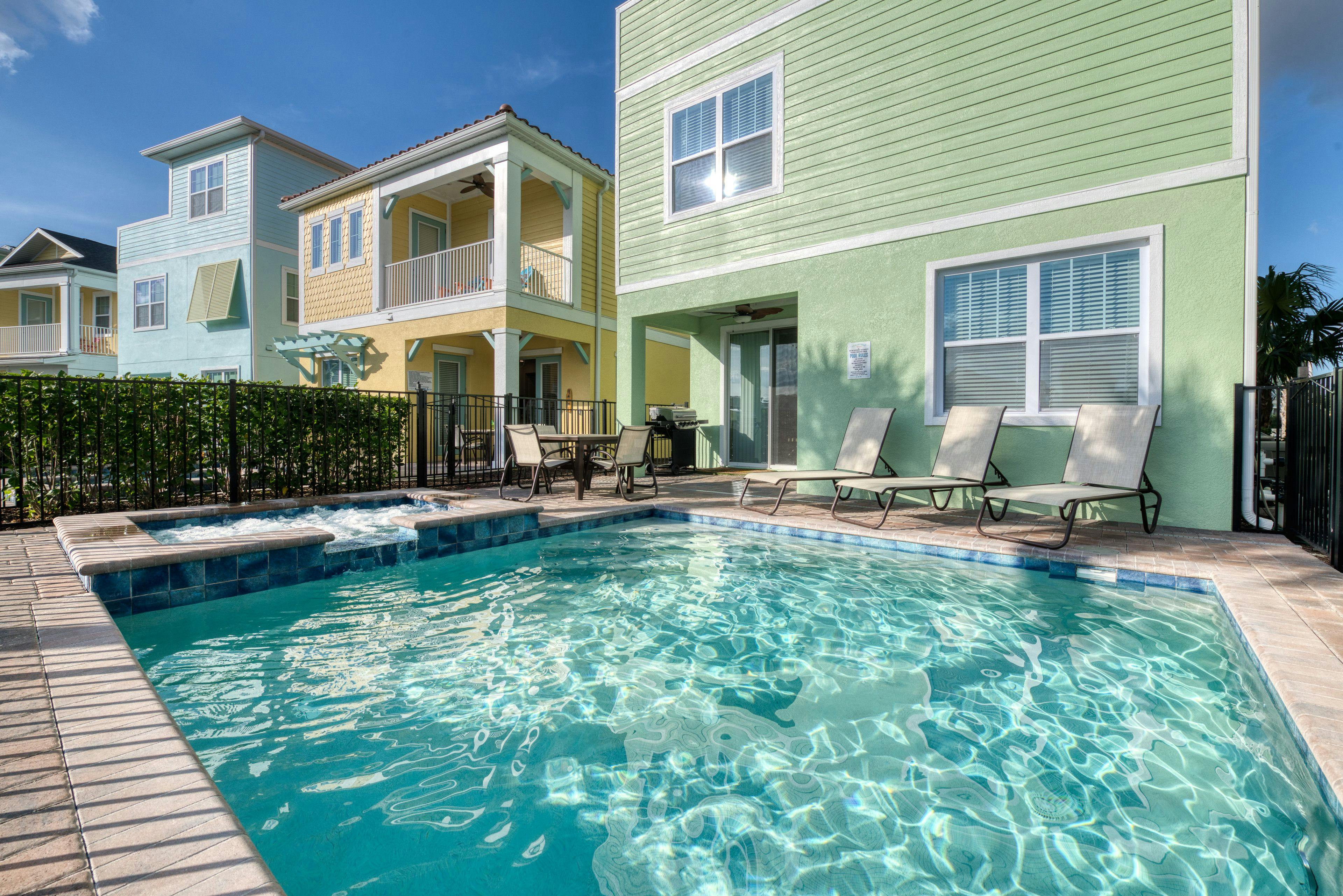 Margaritaville Orlando cottages with pools - Margaritaville 19 green-colored vacation rental with private pool in the back yard