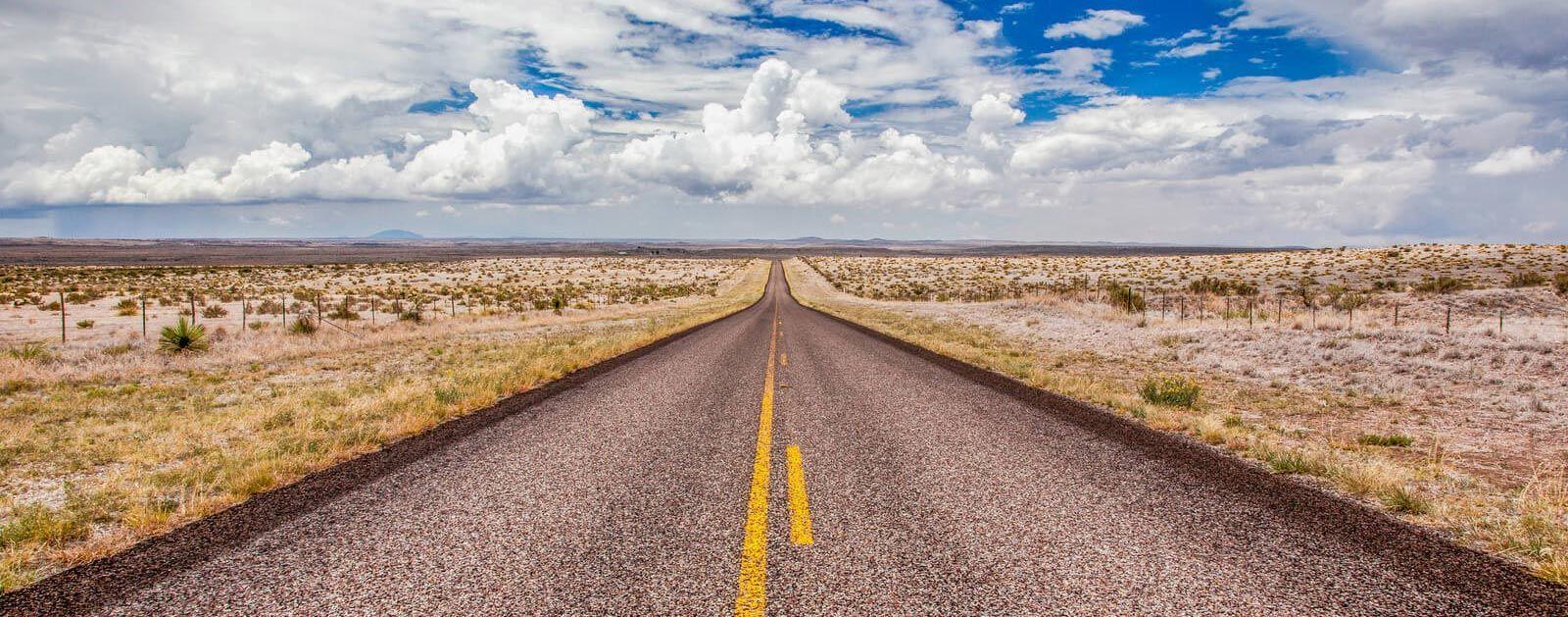 A long, straight road through the Texas landscape