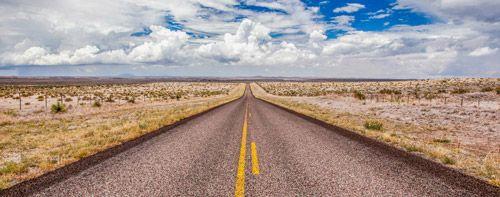 Long straight road through the Texas landscape