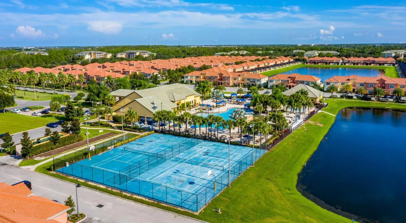 Paradise Palms Resort tennis courts and resort pool