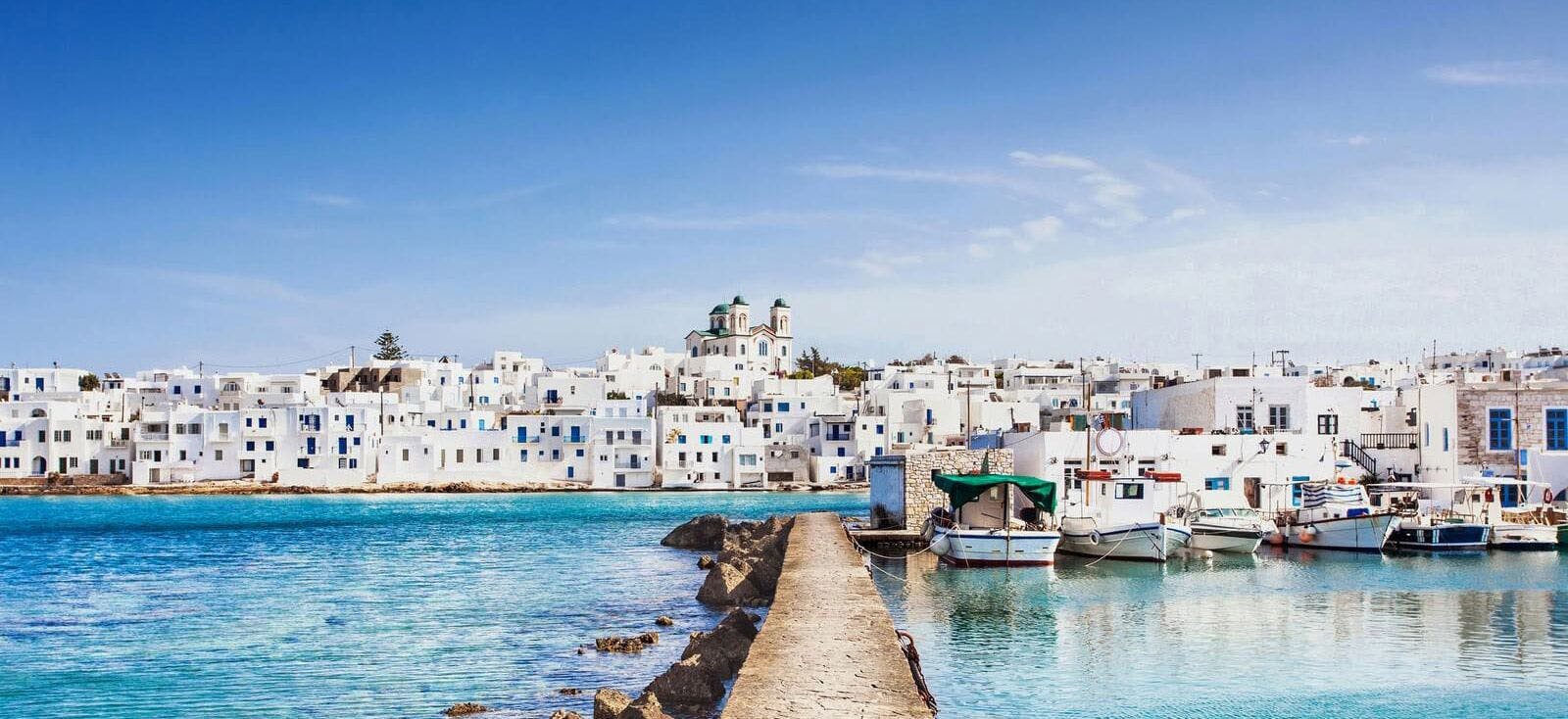 White sugar cube buildings along the seafront in Paros