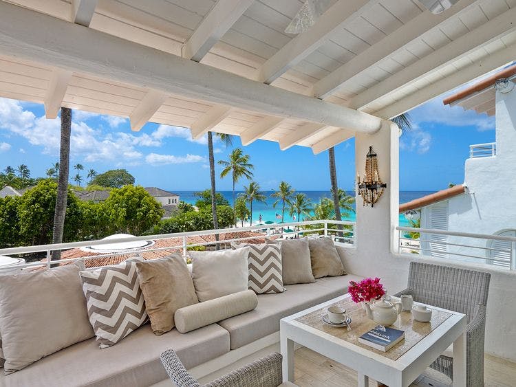 Premium Glitter Bay condos Barbados with beautiful views - Glitter Bay 304 - Golden Sunset condo seating area with sea view