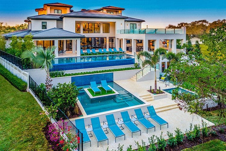 Reunion Resort 15000 large villa in Orlando with private pools and sun loungers