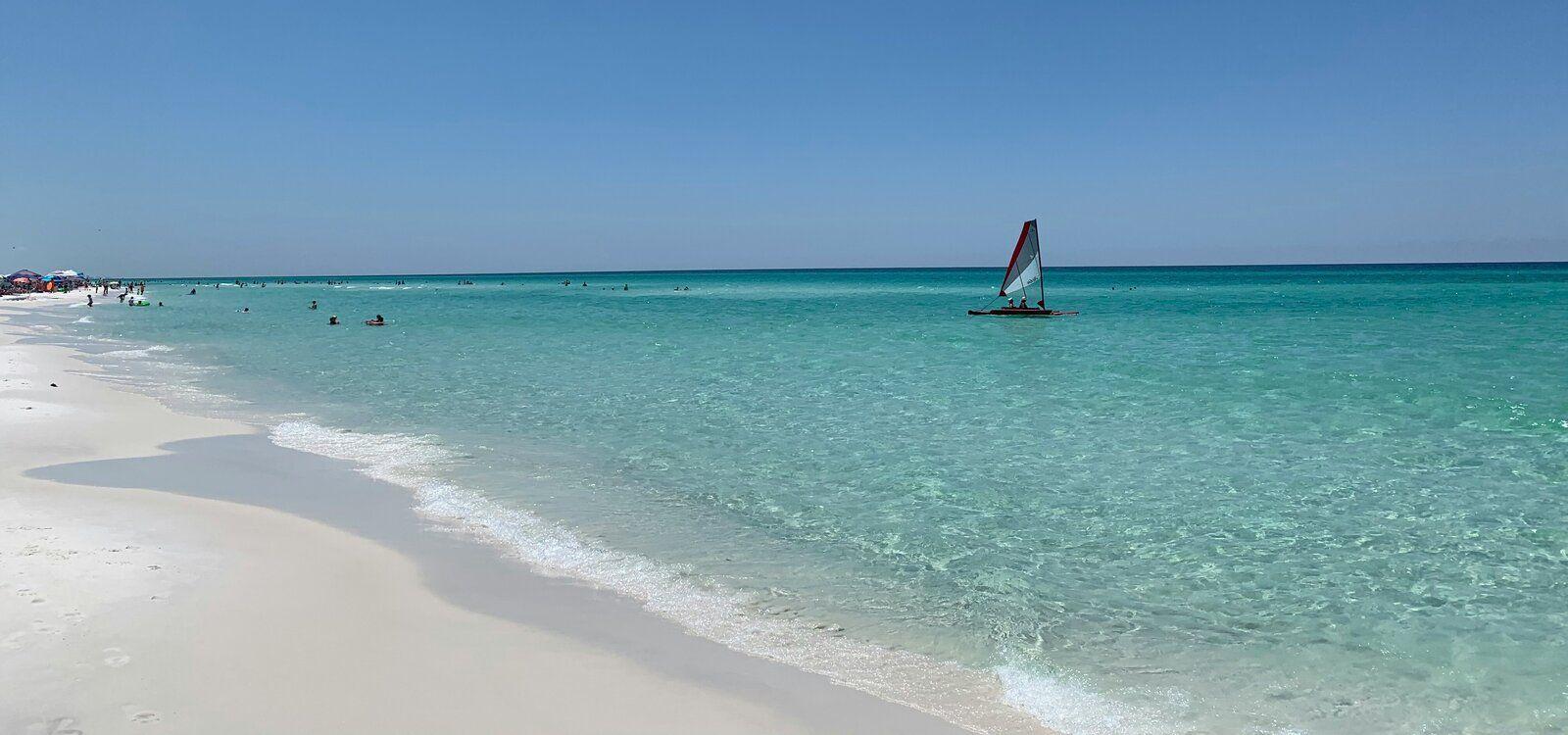 Santa Rosa beach villas, beach view, sailing boat